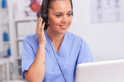 dr with headphones on as if talking online